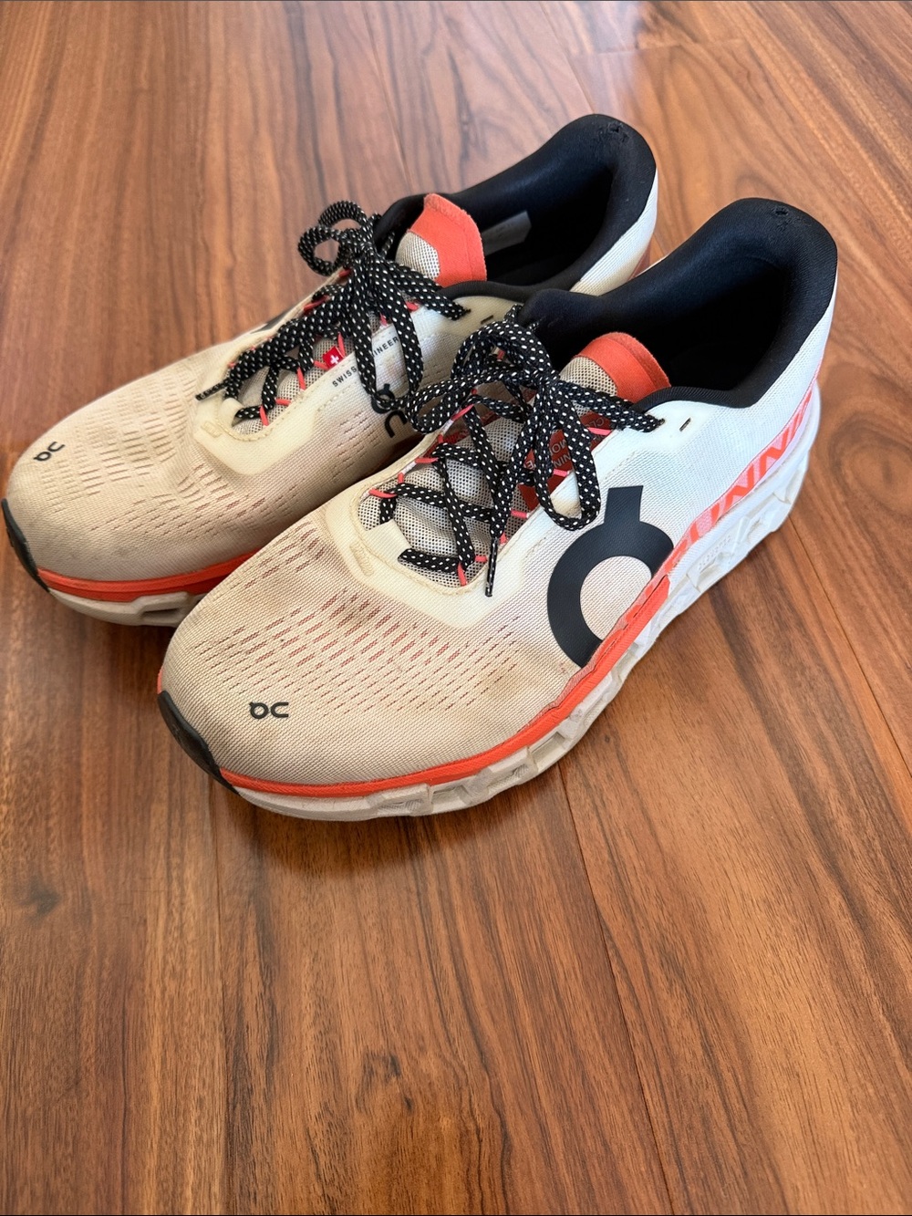 On Running Men's Athletic Shoes in Cream with Orange Accents